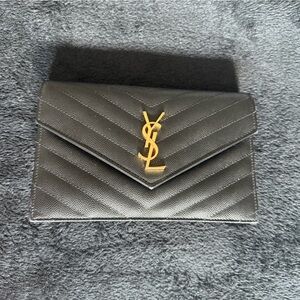 Saint Laurent Black Chevron Clutch with Gold Logo